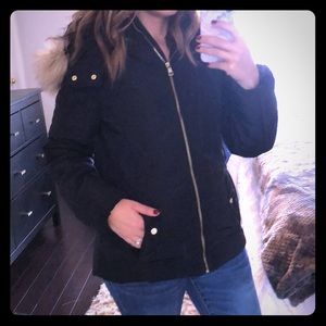 Black puffer cost with faux fur hood